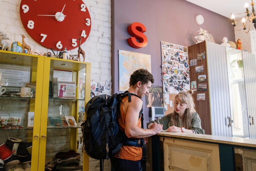 tourist standing in front of reception